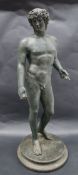 A 19th century bronze statue of David, on a circular plinth base,