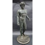 A 19th century bronze statue of David, on a circular plinth base,