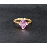 A 9ct yellow gold amethyst set ring, with an oval faceted amethyst, claw set,