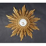 A French carved giltwood Sunburst wall clock,