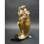 A Chinese bronze dragon-fish form censer, the censer is cast with a fish-form body,