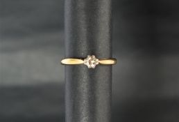 A solitaire diamond ring. the round brilliant cut diamond approximately 0.