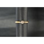 A solitaire diamond ring. the round brilliant cut diamond approximately 0.