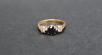 An 18ct yellow gold sapphire and diamond ring,