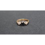 An 18ct yellow gold sapphire and diamond ring,