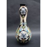 A Moorcroft pottery vase decorated in the Centaurea pattern,