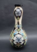 A Moorcroft pottery vase decorated in the Centaurea pattern,