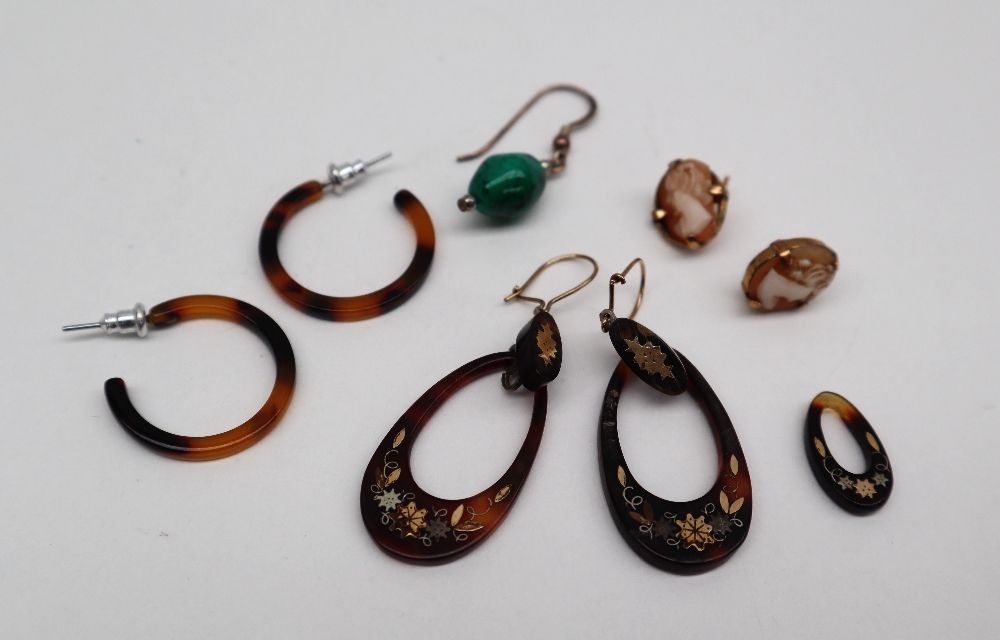 A pair of tortoiseshell and gold and silver pique work drop earrings,