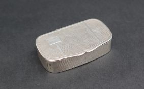 A George VI silver pill box of shaped rectangular form, with engine turned decoration, Birmingham,