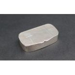 A George VI silver pill box of shaped rectangular form, with engine turned decoration, Birmingham,