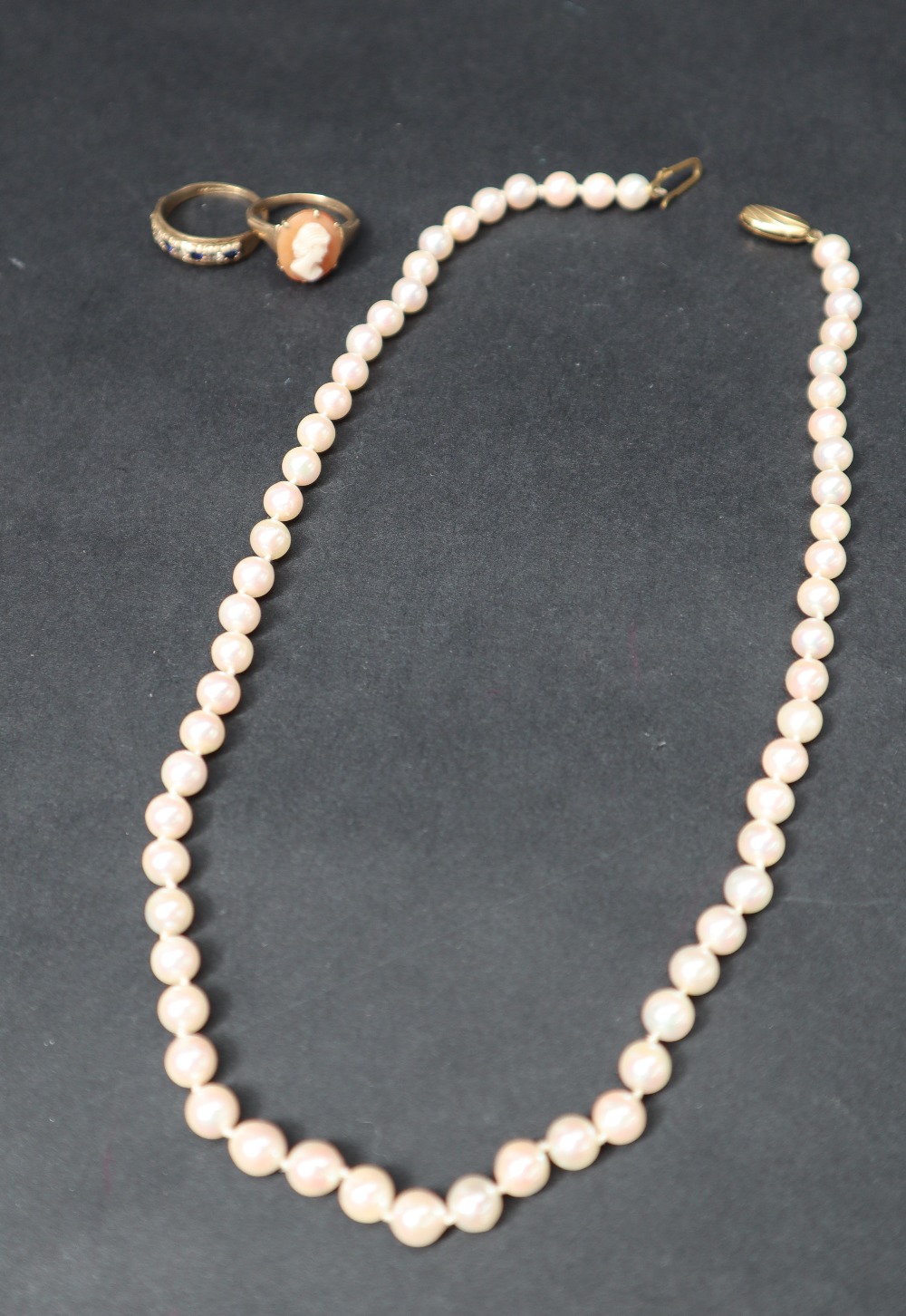 A pearl necklace with sixty one pearls to a 9ct gold clasp, - Image 3 of 4