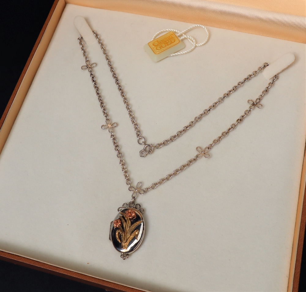 A Clogau silver locket with an applied gold daffodils on a silver necklace, approximately 17. - Image 2 of 4