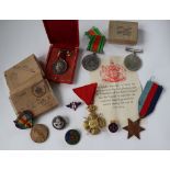 Three World War II medals including The 1939-1945 Star, War Medal and the Defence Medal,