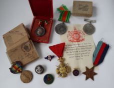 Three World War II medals including The 1939-1945 Star, War Medal and the Defence Medal,