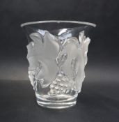 A Lalique glass vase, of flared tapering form, decorated with grapes and leaves, incised "Lalique,