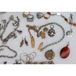 Assorted costume jewellery including beaded necklaces, watches,
