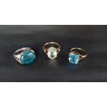A 9ct gold ring set with an emerald cut blue topaz,