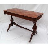 A Victorian rosewood and geometric panelled side table of rectangular form with rounded corners on