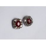 A pair of ruby and diamond earrings,