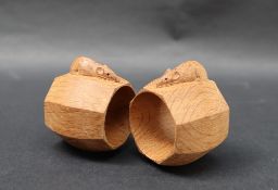 A pair of Mouseman oak napkin rings, by Robert 'MOUSEMAN' Thompson of octagonal shape,