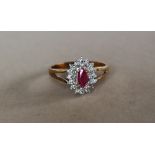 A 9ct yellow gold ruby and diamond cluster ring,