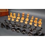 A boxwood and ebonised Staunton pattern chess set, with weighted bases, king 87mm high,