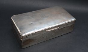 A silver cigarette box, of rectangular form, with line decoration,