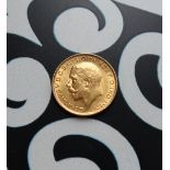 A George V gold sovereign, dated 1912,