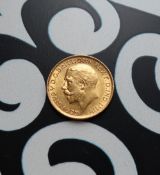 A George V gold sovereign, dated 1912,