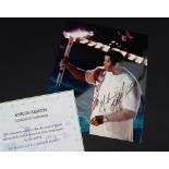 Boxing - A colour photograph of Muhammad Ali signed in black pen "Muhammad Ali", 25 x 20cm,