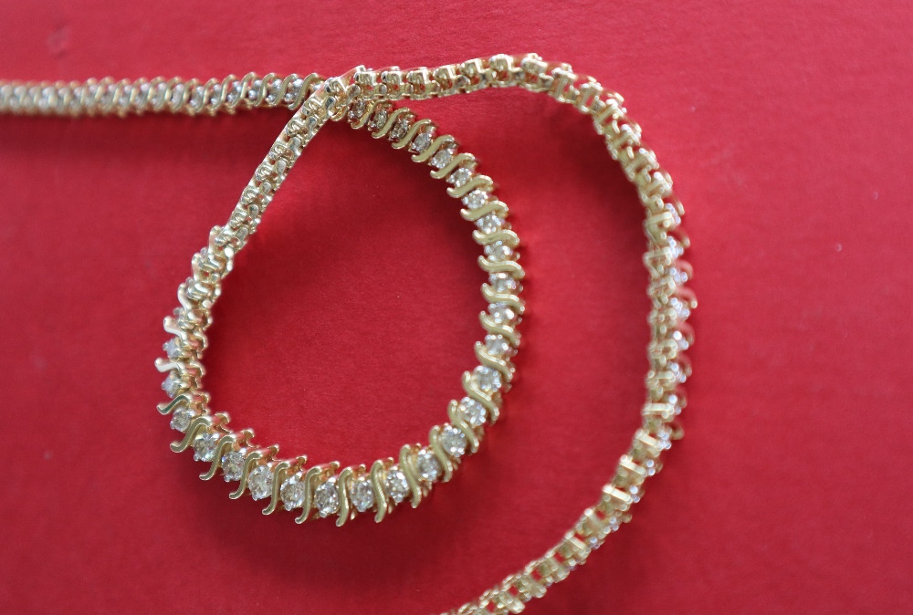 A 14ct yellow gold diamond set necklet set with one hundred and five round brilliant cut diamonds, - Image 3 of 5