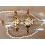 A Lady's 9ct yellow gold wristwatch, the circular dial inscribed Figaro,