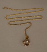 A yellow metal necklace, 45cm long, the bolt ring is stamped 9ct,