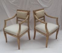 A pair of 19th century French elbow chairs,