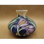 A limited edition Moorcroft pottery vase decorated in the "Saffron Crocus" pattern,