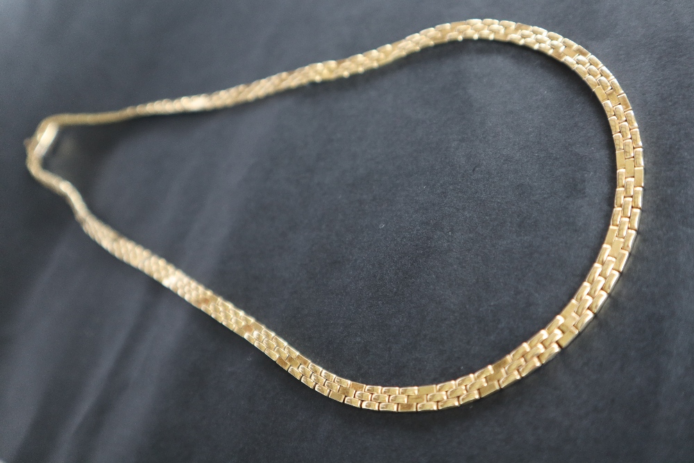 A 14ct yellow gold necklace, with three rows of rectangular links, 42. - Image 2 of 3