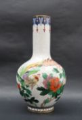 A Cloisonne enamel vase, wit a white ground, decorated with a bird of paradise, and flower heads,