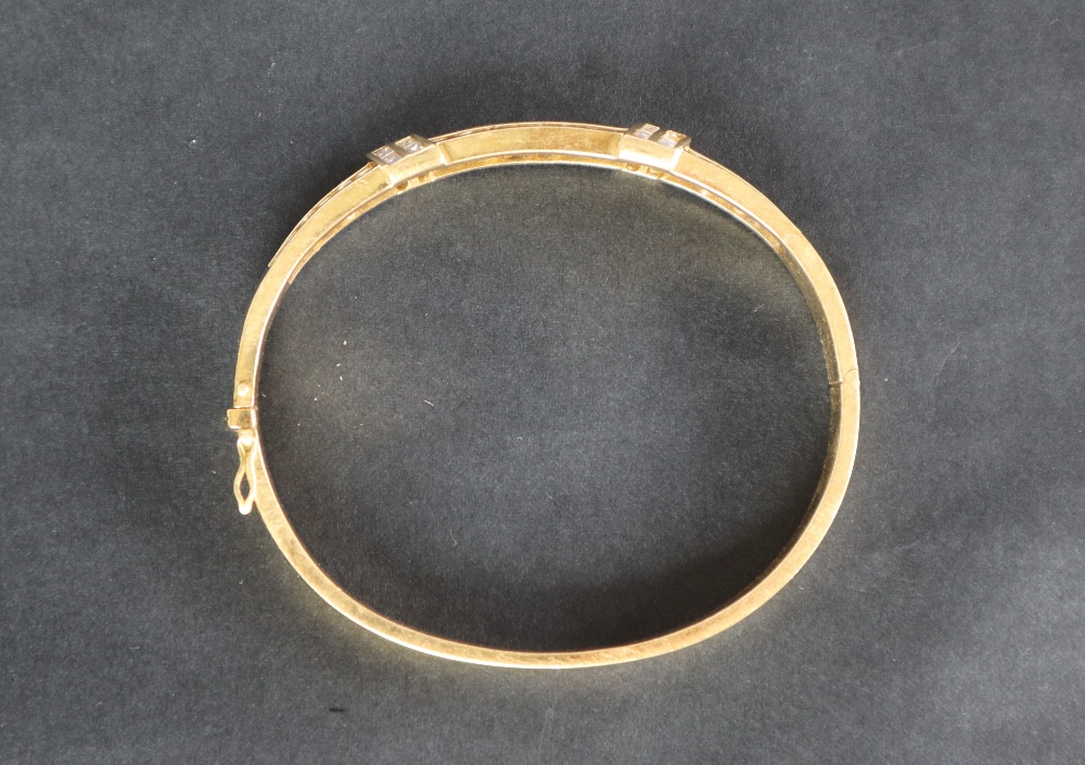 An 18ct yellow gold diamond set hinged bangle, set with two rows of brilliant cut diamonds, - Image 4 of 4