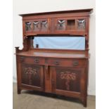 An Art Nouveau oak mirrorback sideboard,