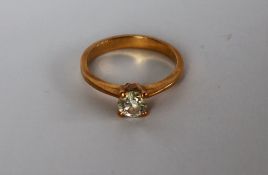 A solitaire diamond ring, the round brilliant cut diamond approximately 0.