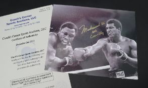 Boxing - A black and white action shot of Muhammad Ali and Joe Frazier,