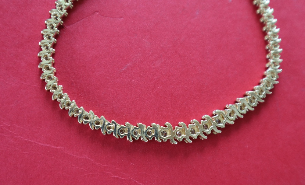 A 14ct yellow gold diamond set necklet set with one hundred and five round brilliant cut diamonds, - Image 5 of 5