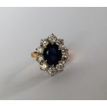 A sapphire and diamond cluster ring,