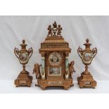 A 19th century French spelter clock garniture, with cherub and vase surmount,