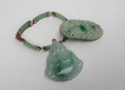 A green jade and white metal sectional bracelet together with a jadeite buddha pendant and a