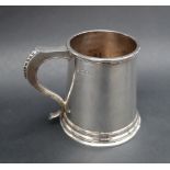 An Elizabeth II silver tankard, of tapering cylindrical form with a spreading foot, London, 1967,