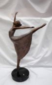 Mario Jason Estrella A ballerina on point with arms raised Bronze with silvered decoration On a