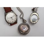 A continental white metal fob watch,