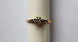 A solitaire diamond ring, the round old cut diamond approximately 0.