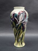 A Moorcroft pottery limited edition inverted baluster vase decorated with purple irises,